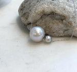 Double pearl floating pendant featuring Akoya and Edison pearls with 18K gold details