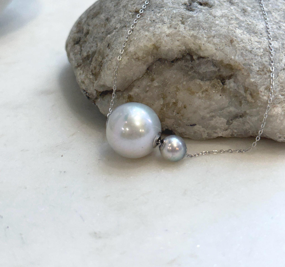 Minimalist floating pearl pendant with Akoya and Edison pearls and 18K gold accents