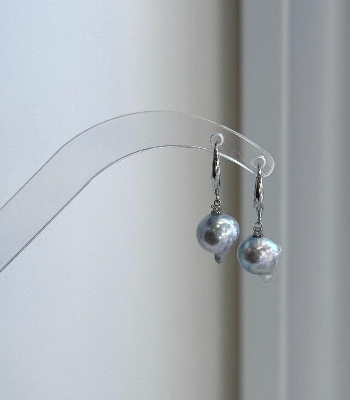 Genuine Akoya ocean tail pearl hook earrings with extreme mirror luster and S925 sterling silver.