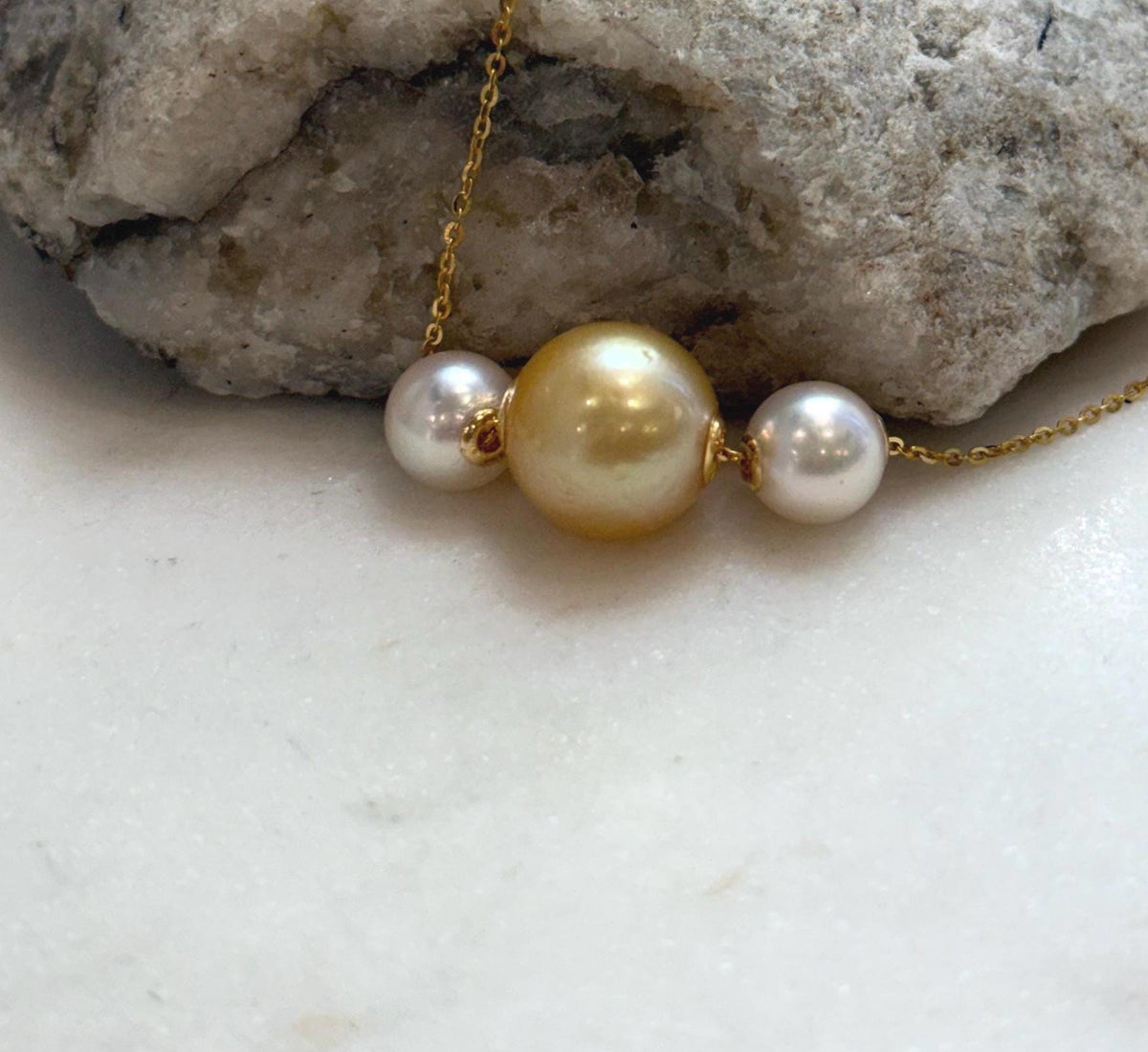 Minimalist three pearl necklace pendant with golden South Sea and Akoya pearls