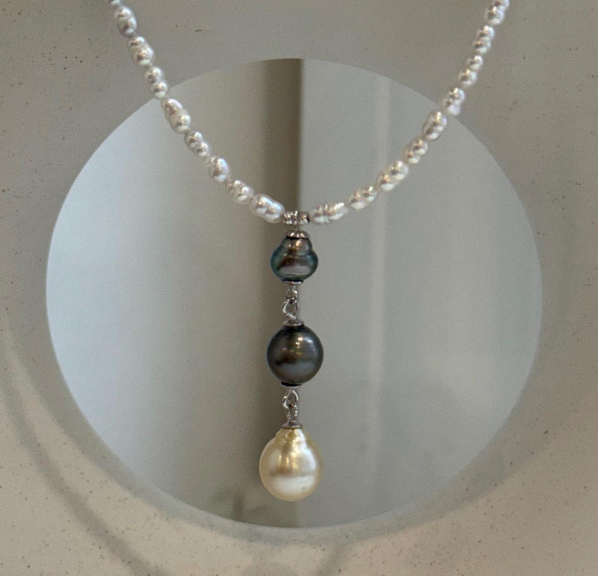 Three pearl drop necklace featuring Tahitian Keshi and South Sea golden pearls