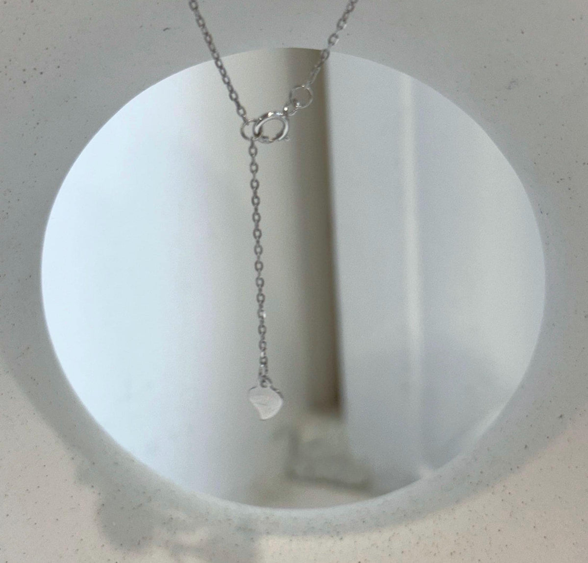 Two color pearl bicycle necklace featuring Tahitian platinum and South Sea golden pearls.