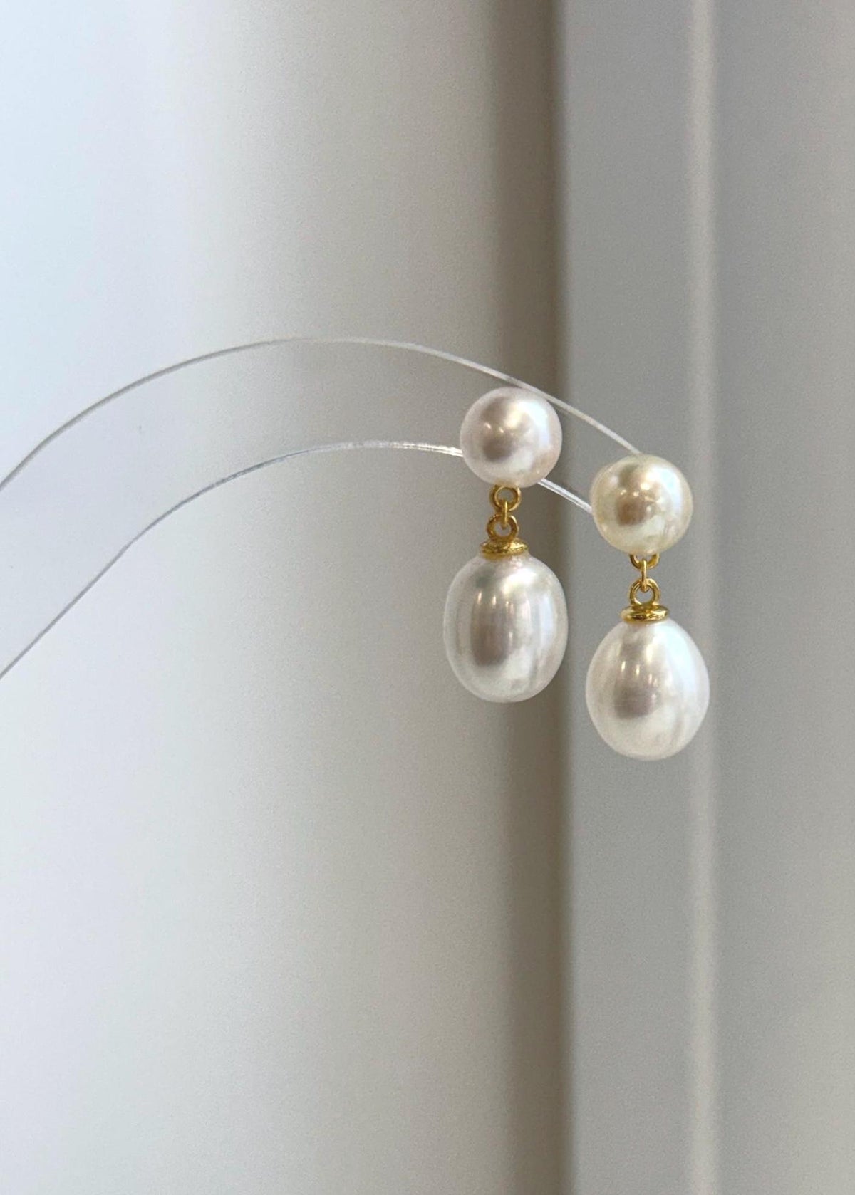 Akoya ocean and freshwater pearl drop earrings with extreme mirror luster