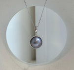 Ocean Mabe pearl necklace with bright metallic shine and strong mirror reflection