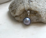 Elegant platinum color Mabe pearl pendant set in S925 sterling silver