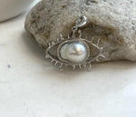 White baroque South Sea pearl pendant with bright luster and silver setting