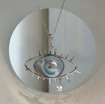 Statement Ocean Mabe pearl necklace with a modern eye-shaped design