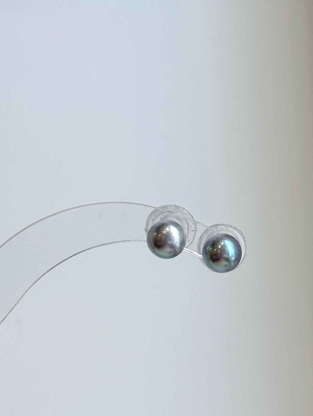 Classic round Akoya pearl earrings with extreme mirror-like luster