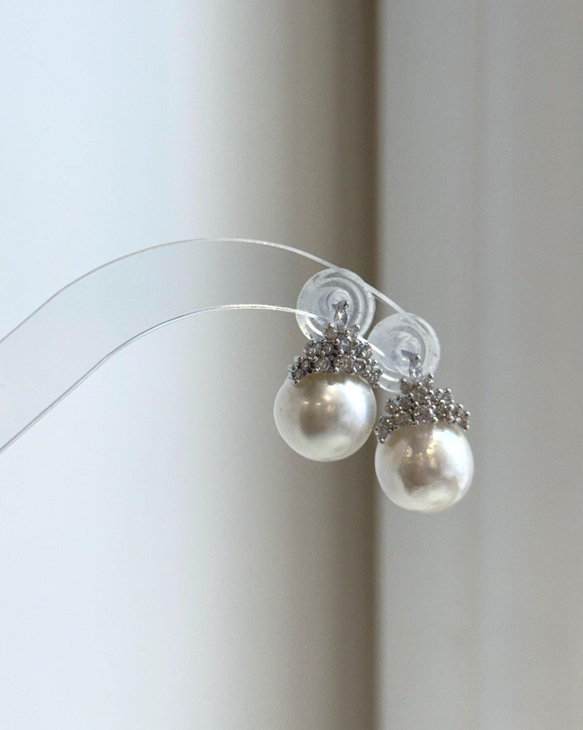 Genuine South Sea white pearl stud earrings with sparkling crown design