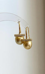 Elegant South Sea pearl drop earrings in a sophisticated hook design