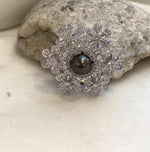 Elegant platinum Tahitian pearl snowflake jewelry with extreme reflective mirror luster