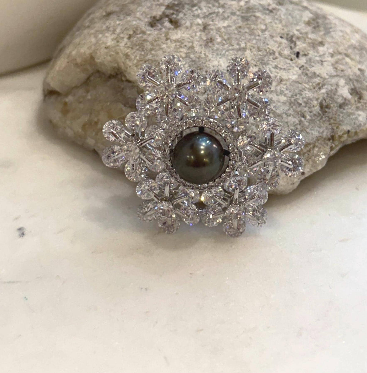 Elegant platinum Tahitian pearl snowflake jewelry with extreme reflective mirror luster