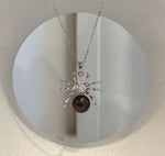 Tahitian platinum pearl Halloween spider pendant featuring a genuine saltwater pearl