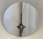 10.4mm Tahitian black pearl molten lava pendant with genuine saltwater ocean pearl