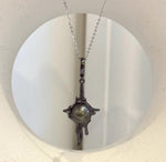 Tahitian black pearl lava pendant with extreme luster and copper setting