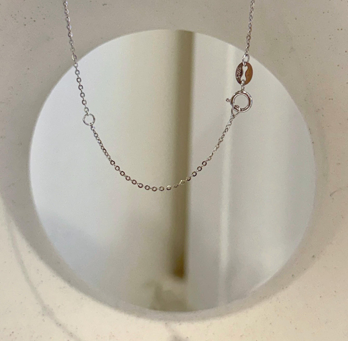 Artistic molten lava pendant with genuine Tahitian peacock pearl and copper setting