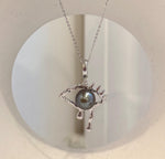 Halloween eye pendant featuring a lustrous genuine Tahitian saltwater pearl