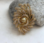 South Sea golden pearl brooch pendant in an elegant black and gold Art Deco design