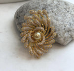 Black and gold floral brooch pendant with a genuine saltwater pearl centerpiece