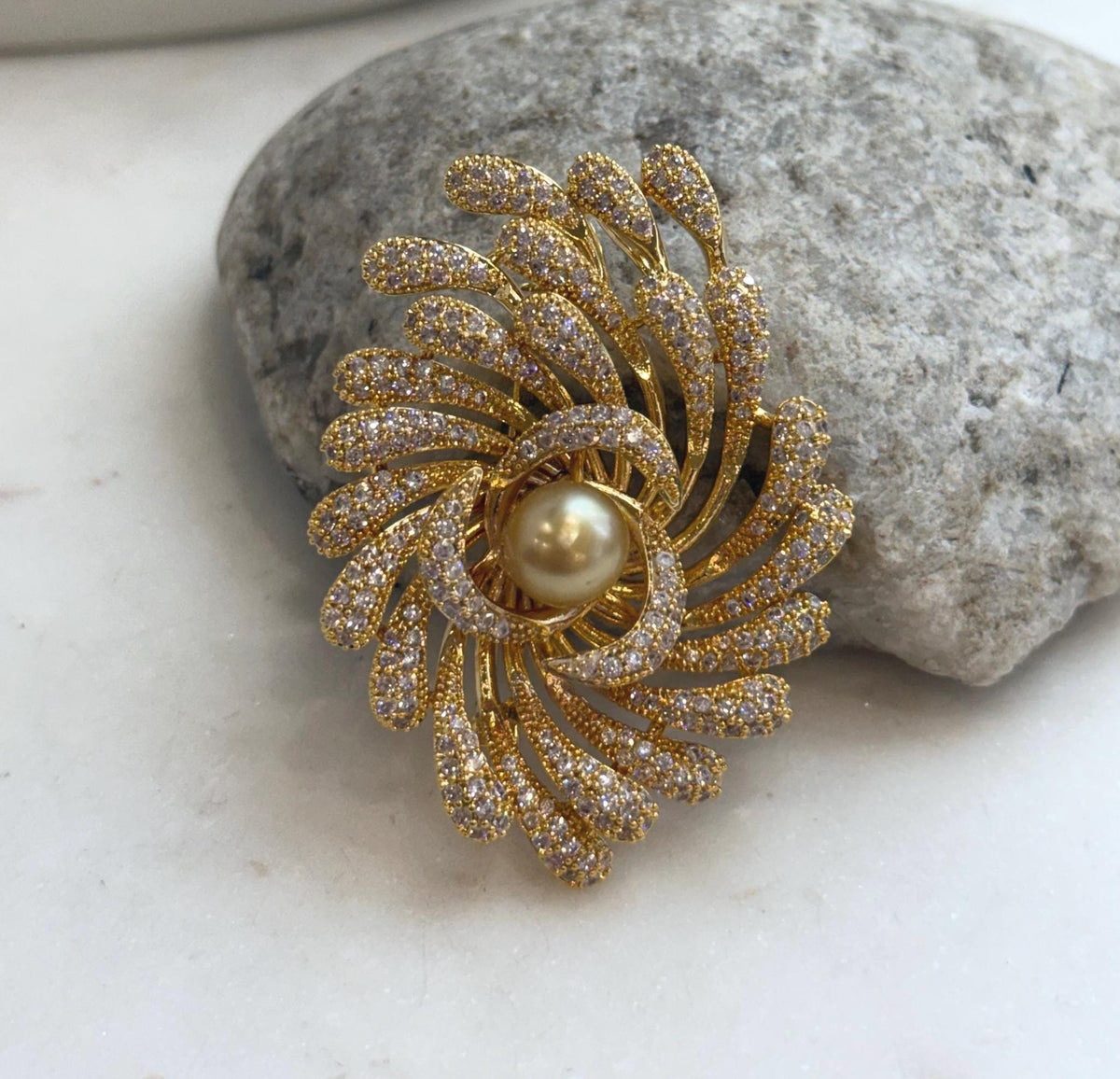 Black and gold floral brooch pendant with a genuine saltwater pearl centerpiece