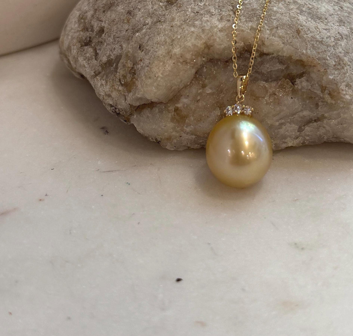 Elegant 18K real gold pendant with a genuine South Sea deep tea gold pearl and sparkling moissanite accents.