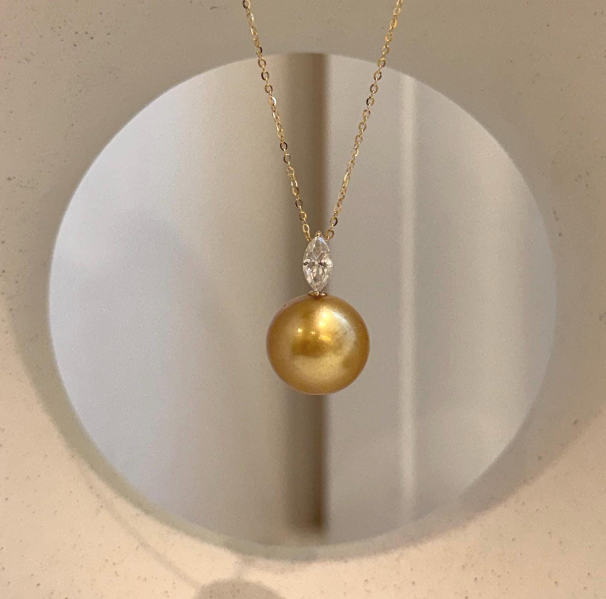 Huge South Sea deep tea golden pearl pendant in 18K real gold with a sparkling marquise moissanite accent.