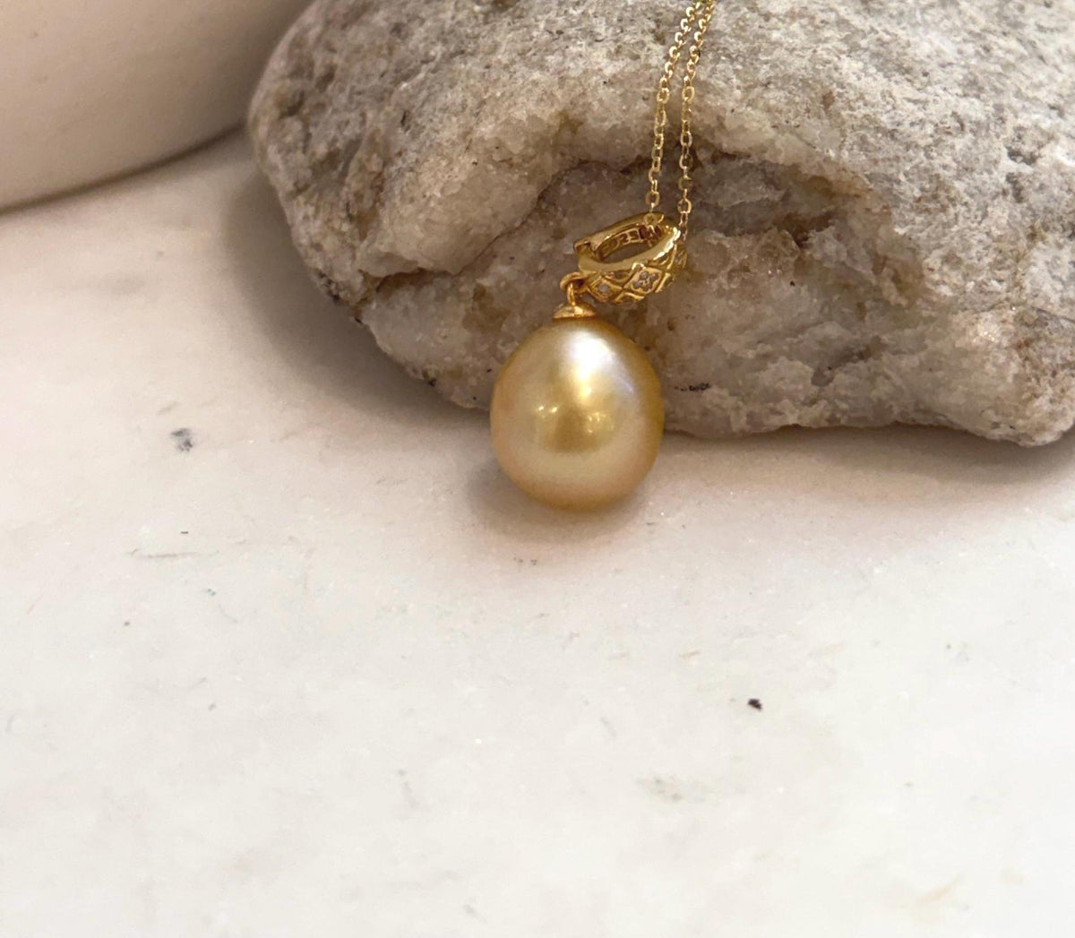 Deep tea gold South Sea pearl pendant showcasing natural saltwater pearl beauty and high luster.