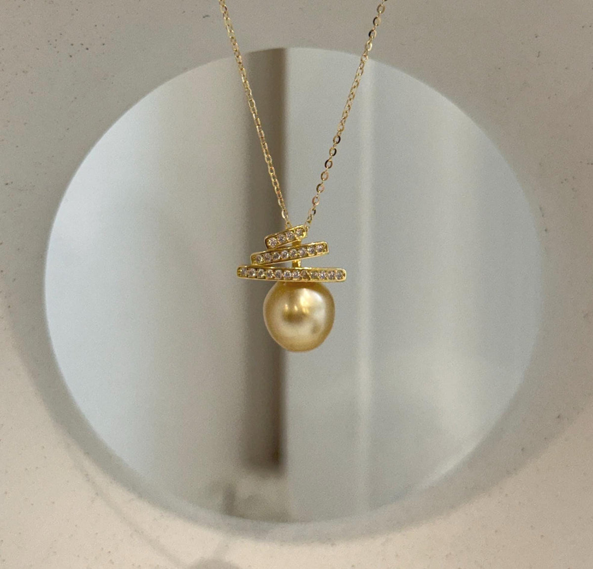 Elegant South Sea golden pearl pendant with contemporary geometric sterling silver setting