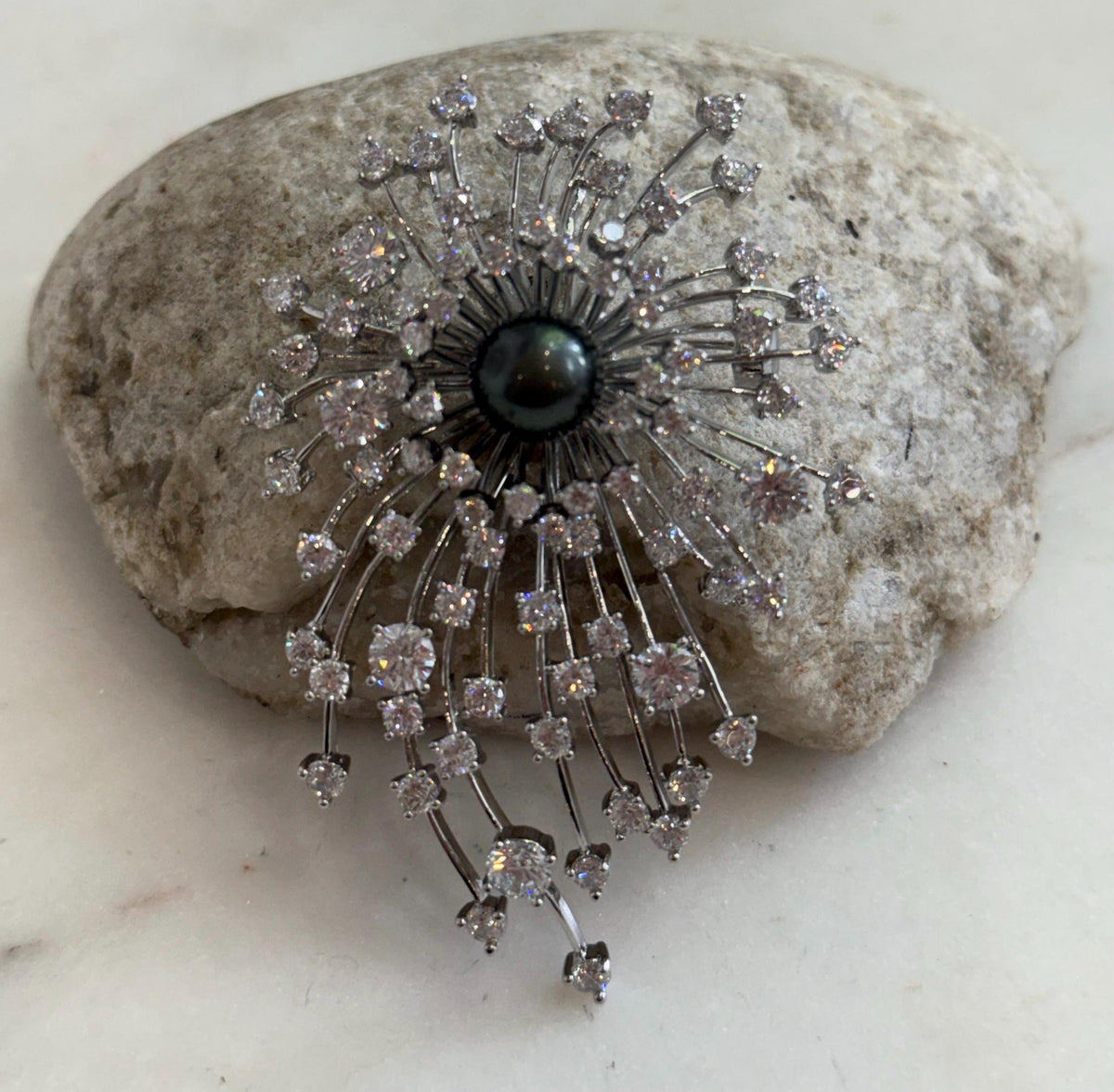 Genuine saltwater Tahitian pearl with a dark piano black color and striking luster.