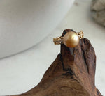 Deep golden South Sea pearl set on a vintage-style gold-plated ring.