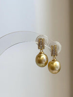 Genuine saltwater South Sea golden pearl earrings with rich deep tea color