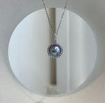 Round Akoya pearl pendant showing beautiful platinum tones and strong mirror-like ocean pearl luster