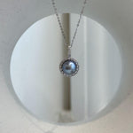 Elegant Akoya platinum pearl necklace featuring a round pearl with bright reflective surface