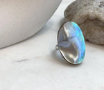 Rainbow iridescent Ocean Mabe pearl statement ring with vivid blue green overtones and extreme mirror luster