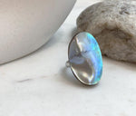 Genuine Mabe pearl ring with luminous silver blue green overtones and artistic statement design
