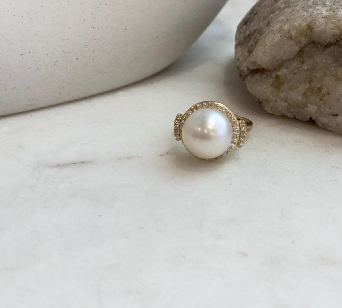 Large round South Sea white pearl ring with bright reflective luster