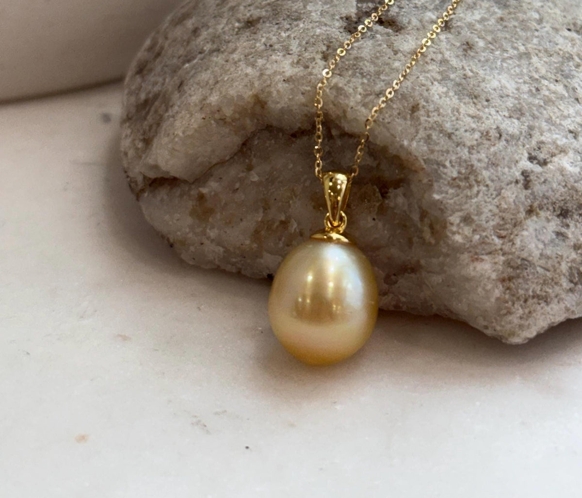 Luxury deep tea gold pearl pendant with elegant silver setting