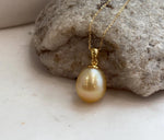 Luxury deep tea gold pearl pendant with elegant silver setting
