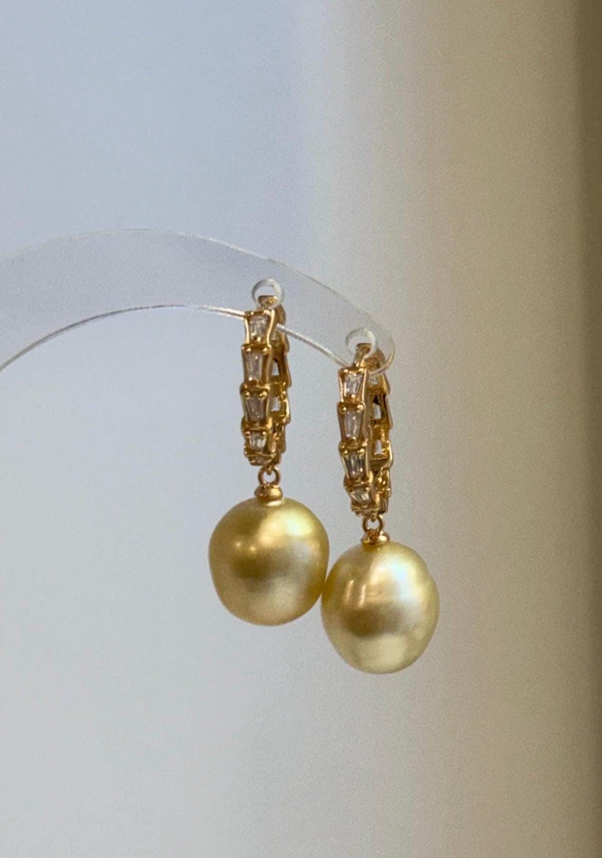 Close-up of genuine golden South Sea pearls with bright, reflective luster.