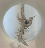 Akoya pearl bird pin that can also be worn as a necklace pendant