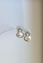 S925 sterling silver studs paired with glossy freshwater pearls