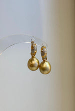 Close-up of the warm golden color and reflective luster of the South Sea pearls.