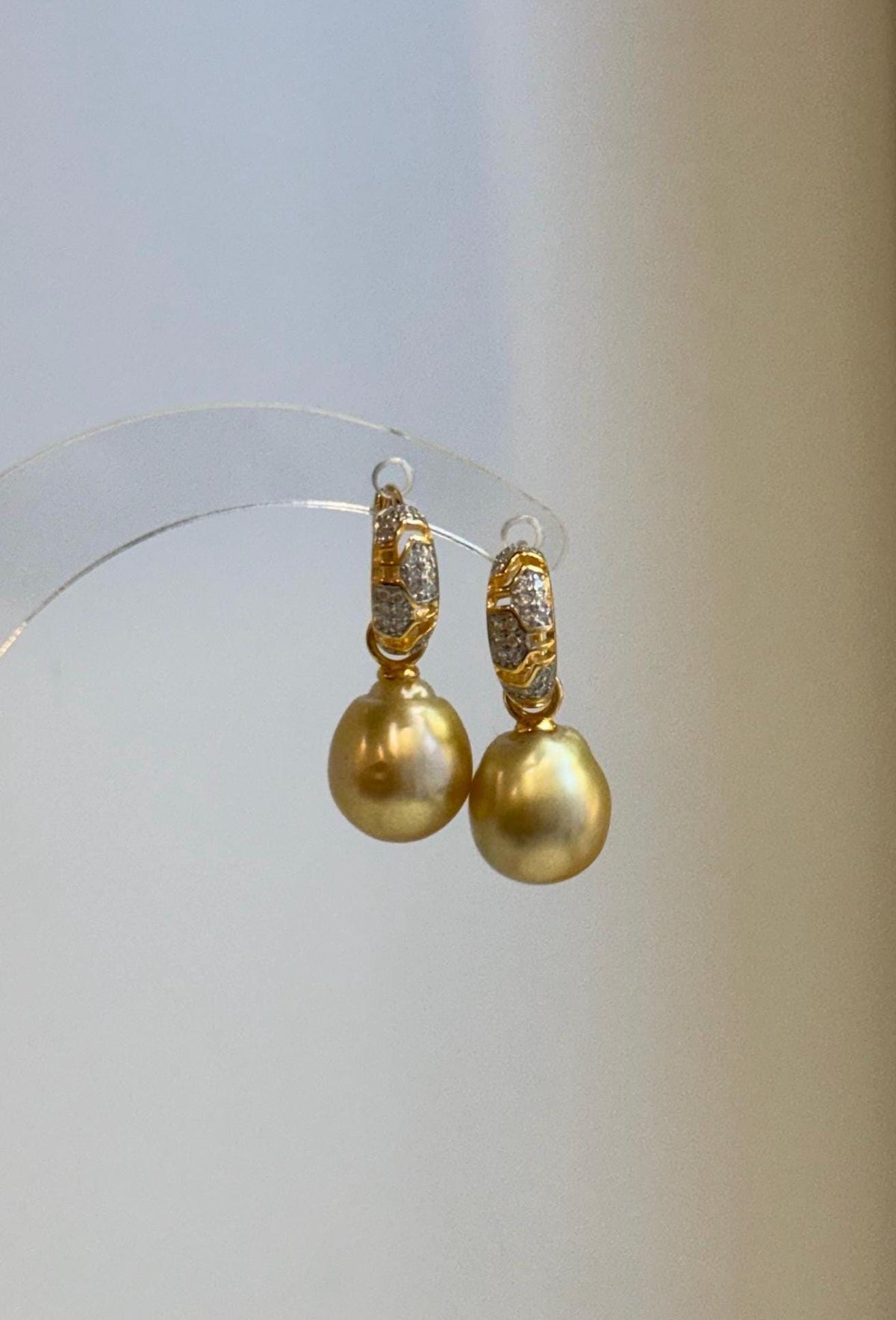 Close-up of the warm golden color and reflective luster of the South Sea pearls.