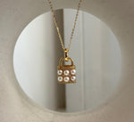 Gold-tone S925 sterling silver handbag pendant decorated with Akoya pearls and sparkling crystals