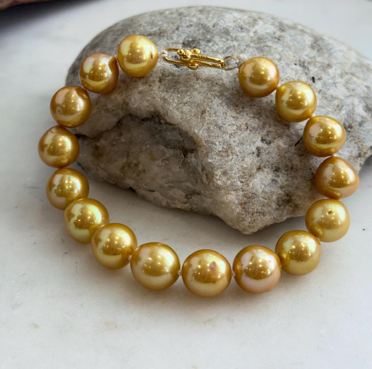 Classic golden pearl bracelet made with genuine freshwater Edison pearls.