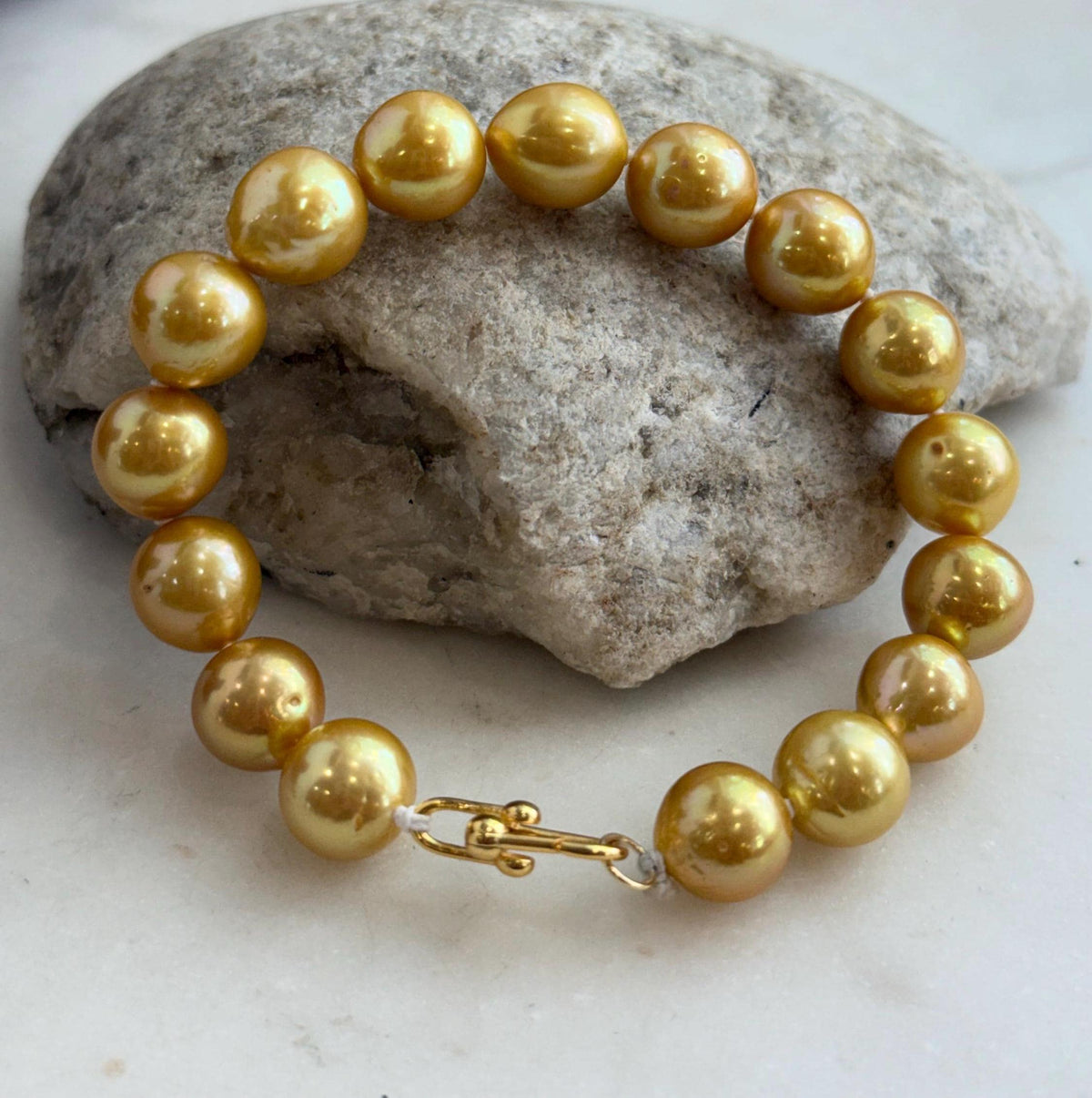 Golden Edison pearl strand bracelet with a simple, elegant design.