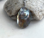 Saltwater Mabe pearl pendant with a luminous, domed surface