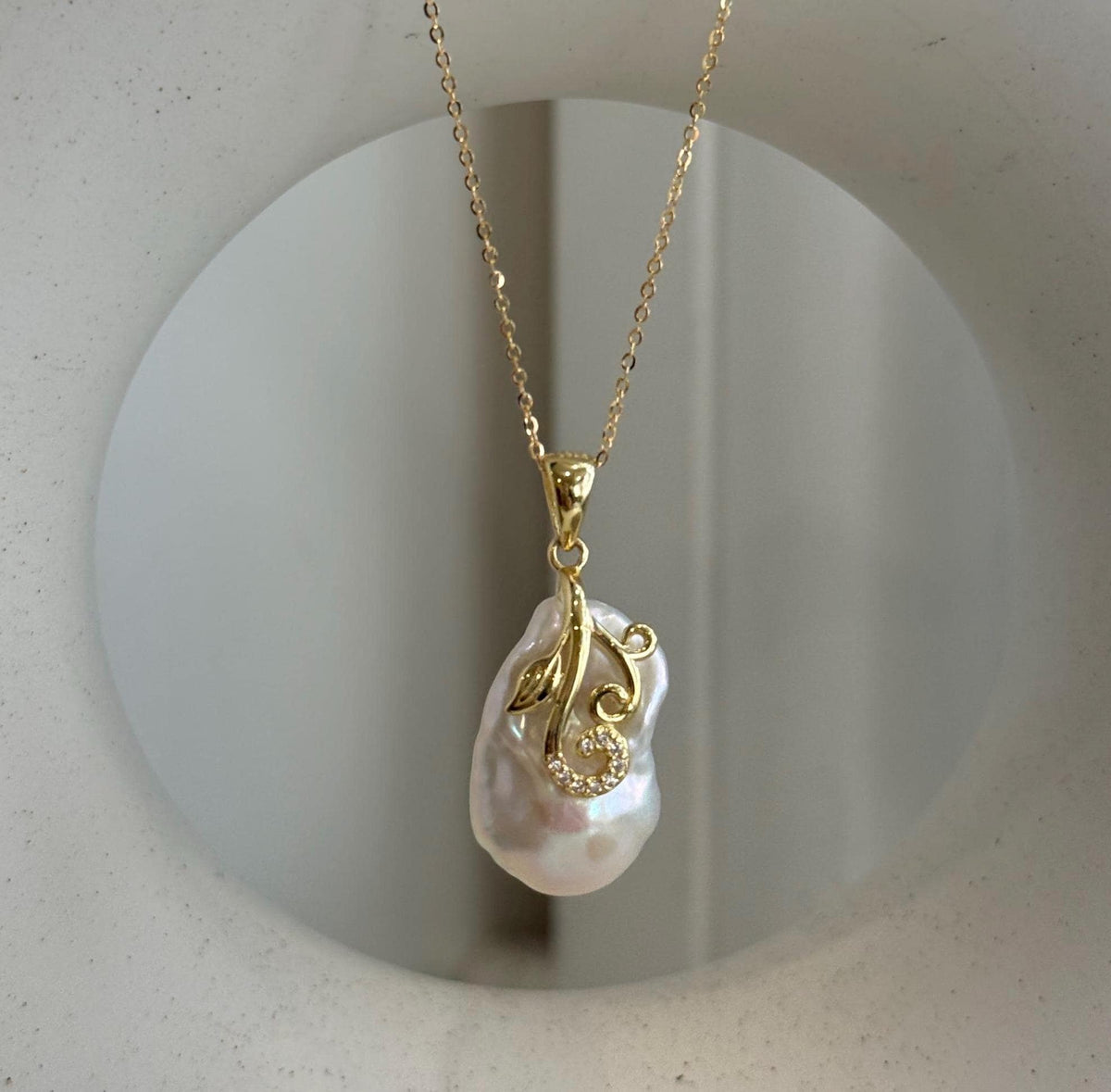 Set of two white iridescent baroque pearl pendants with S925 sterling silver fittings