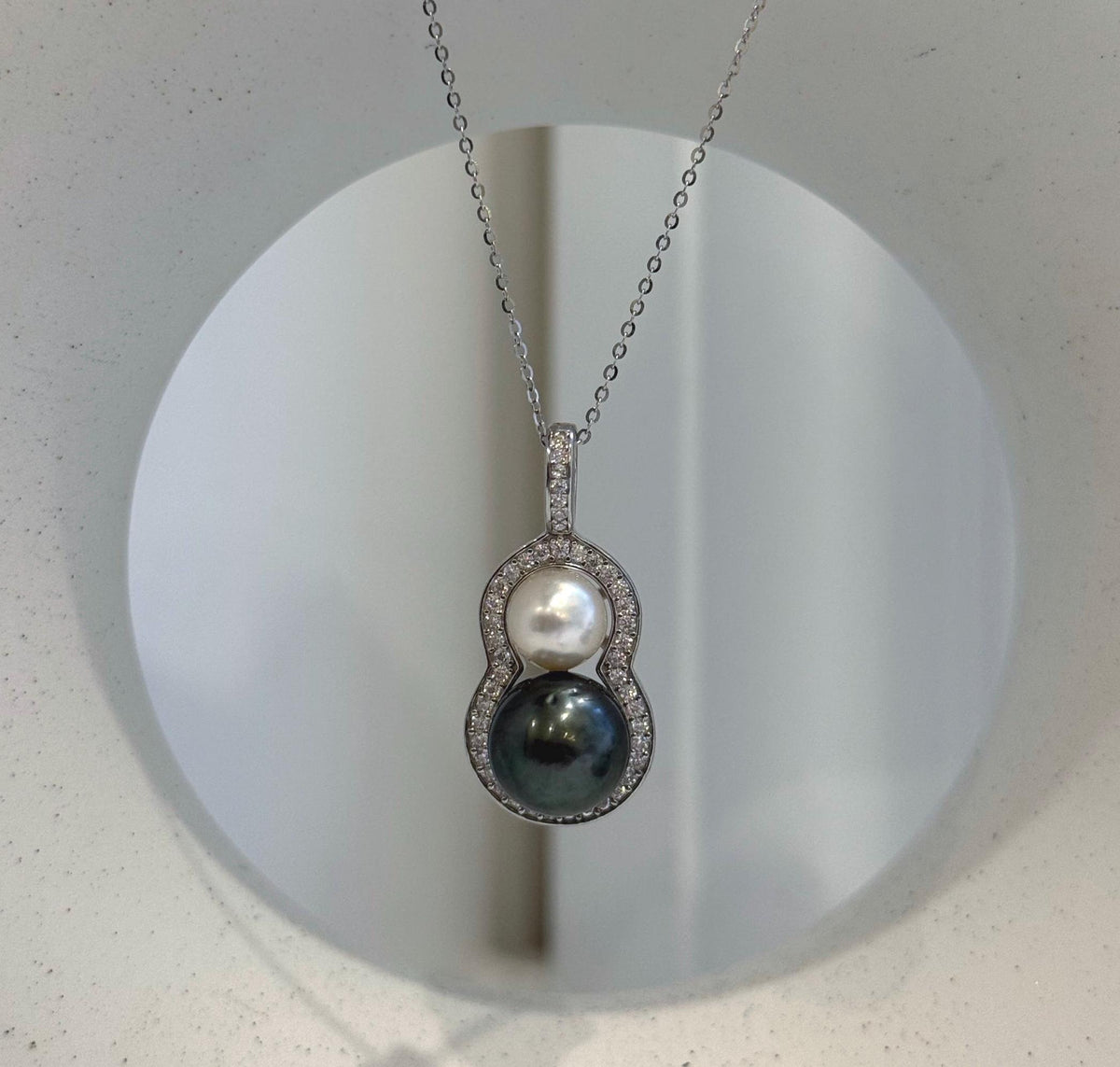 Double pearl gourd pendant with South Sea and Tahitian saltwater pearls in an S925 sterling silver setting.