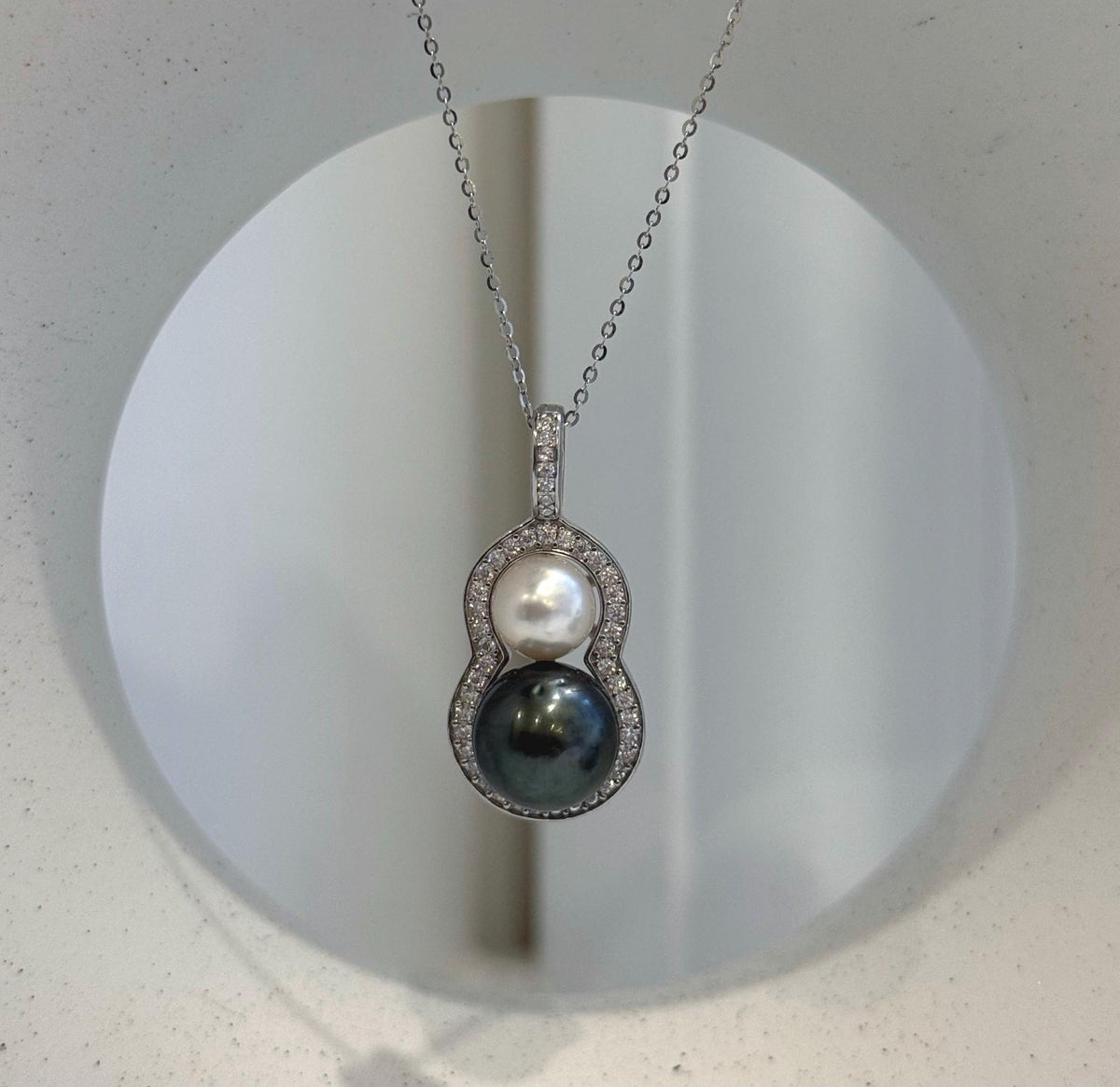 Detail of the sterling silver setting holding the South Sea and Tahitian pearls.